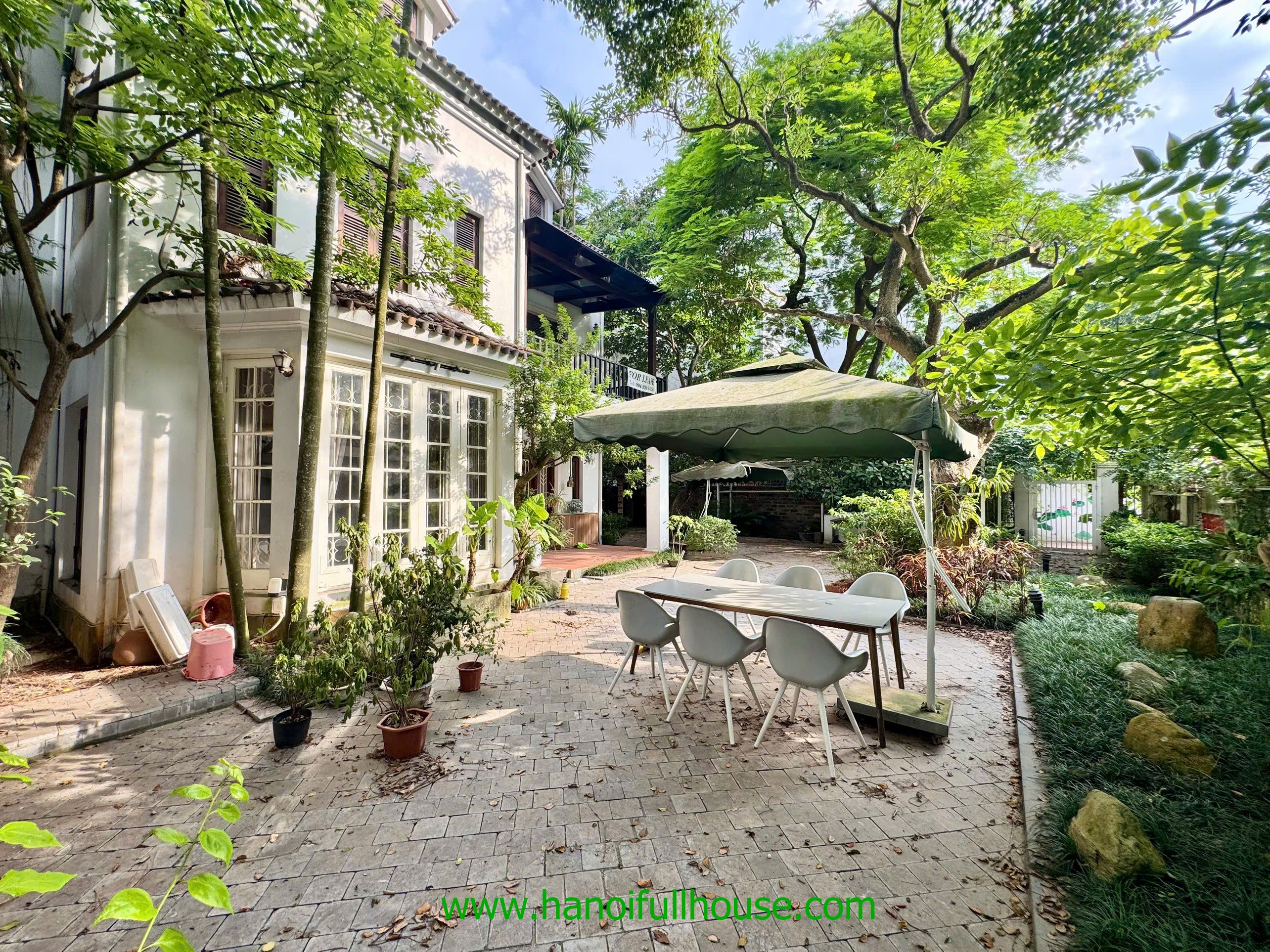 Amazing villa on Dang Thai Mai street has 6 bedrooms, large garden and yard for lease.
