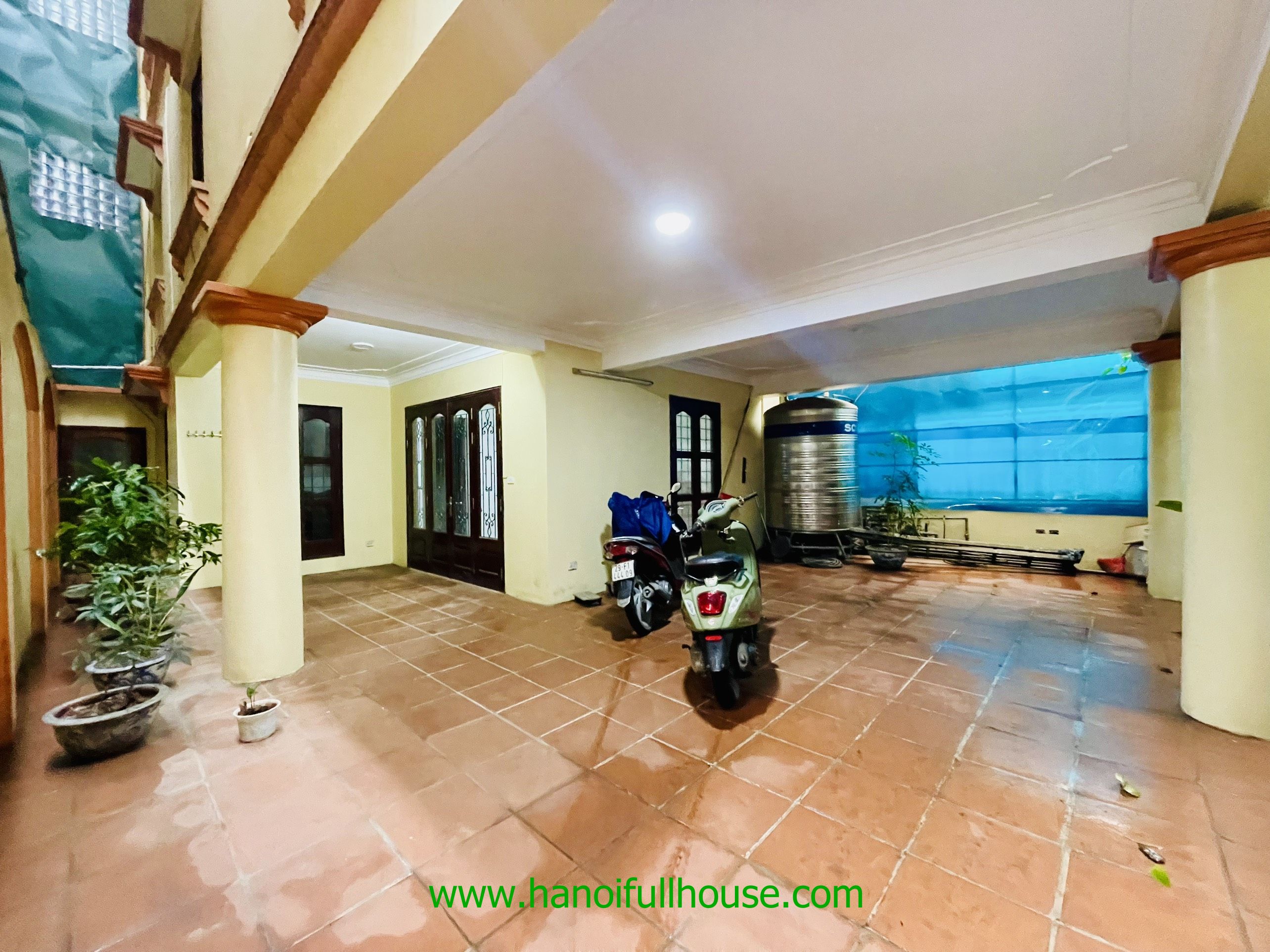 This 5 bedroom house with large yard, partly furnished to rent in Tay Ho 