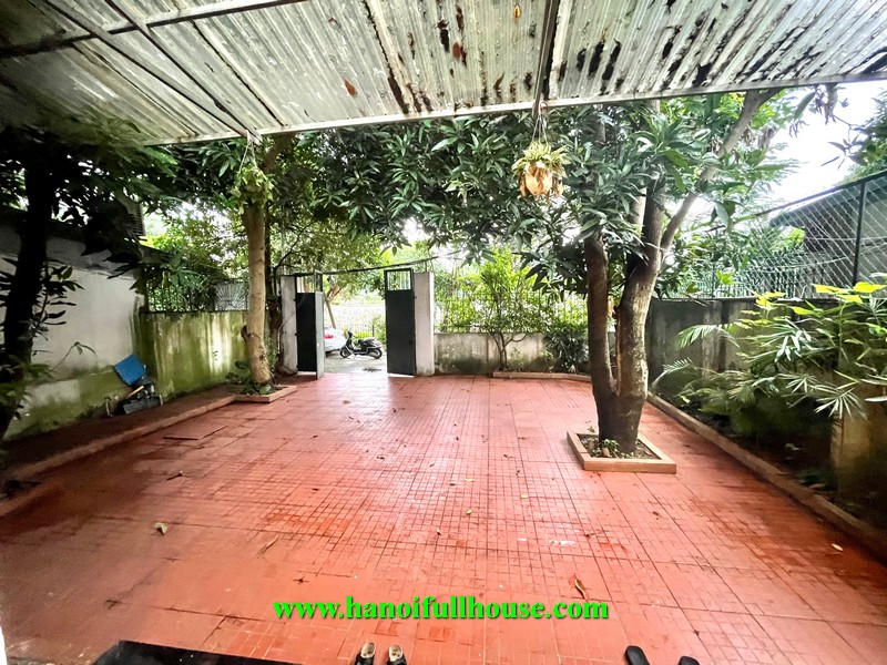 A nicely furnished house has two bedroom in Tay Ho with a big yard for rent