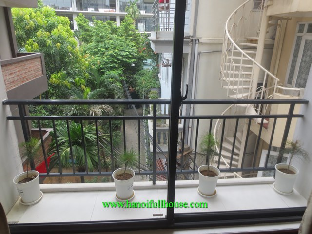 A nice and bright two-bedroom serviced apartment with a balcony in Tay Ho dist for rent