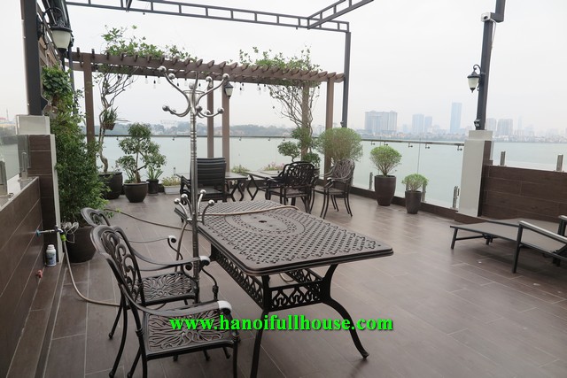 Beautiful serviced apartment for rent on West Lake, Yen Phu Village with balcony and terrace.