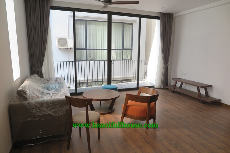 Beautiful apartment in Tay Ho street with balcony, high speed elevator, wooden floor for rent.