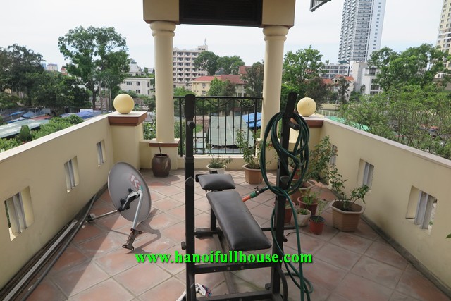 4-bedroom house for rent on Dang Thai Mai street with garage and nice terrace.