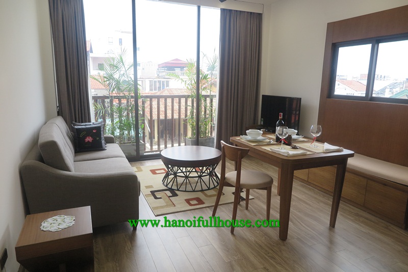 Beautiful apartment in Tu Hoa street, nice balcony, wooden floor, furnished for rent.