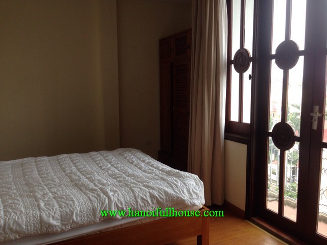 A two-bedroom furnished apartment with 2 bathrooms, big balcony on Xuan Dieu str for rent