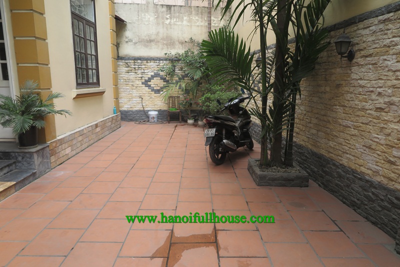 Wonderful house in Tay Ho street, 4 bedrooms, high quality furniture, yard and garden for lease.
