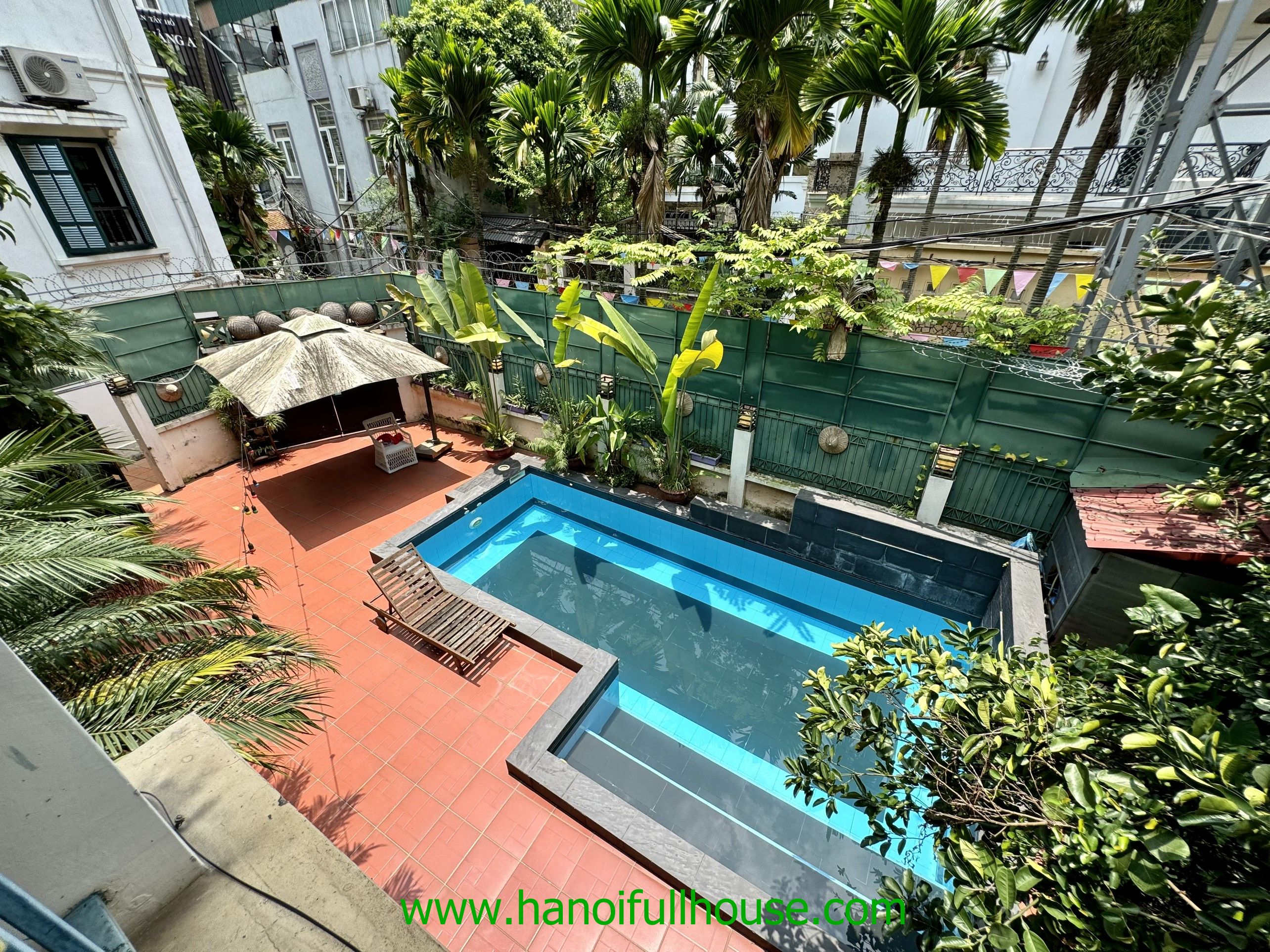 A big court-yard villa with a swimming pool on To Ngoc Van str, Tay Ho for rent
