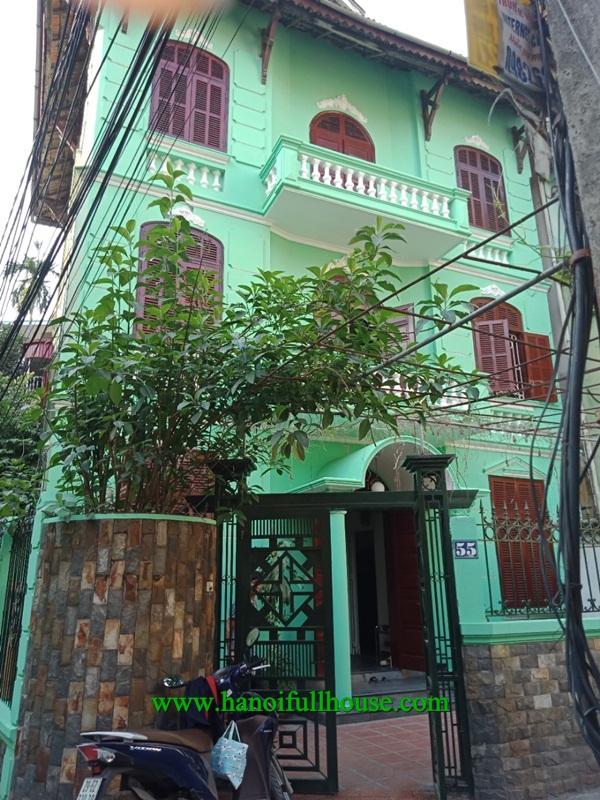 Nice house on Tran Cung street, 4 bedrooms, big balconies and terrace and a large yard for rent.