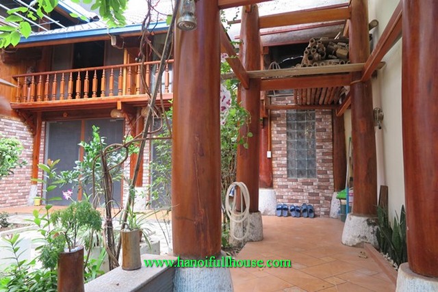 Beautiful garden house in Doi Can street for lease. Three bedroom house with fully furnished