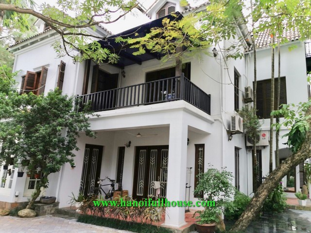 Amazing villa on Dang Thai Mai street has 6 bedrooms, large garden and yard for lease.